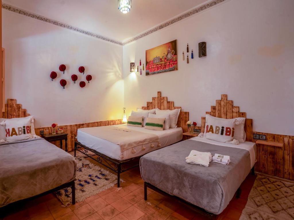 Postel nebo postele na pokoji v ubytování Riad Dar Nakhla