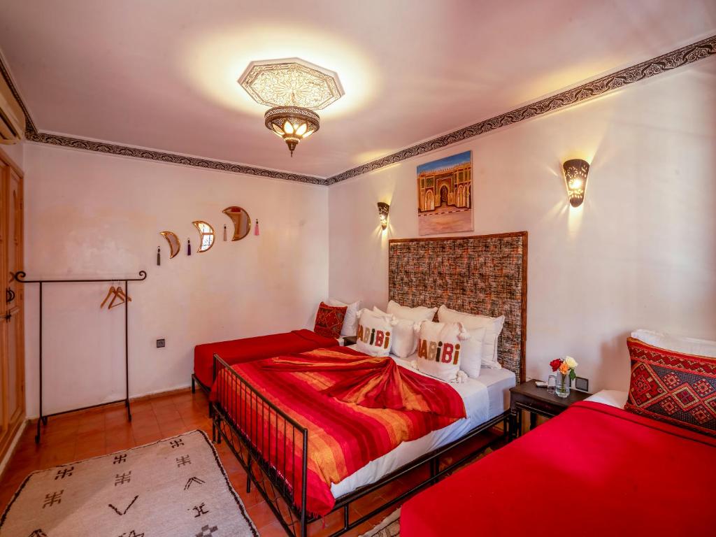 Postel nebo postele na pokoji v ubytování Riad Dar Nakhla