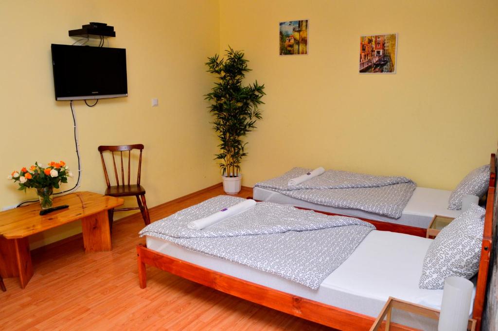 Postel nebo postele na pokoji v ubytování Mediterrán Vendégház