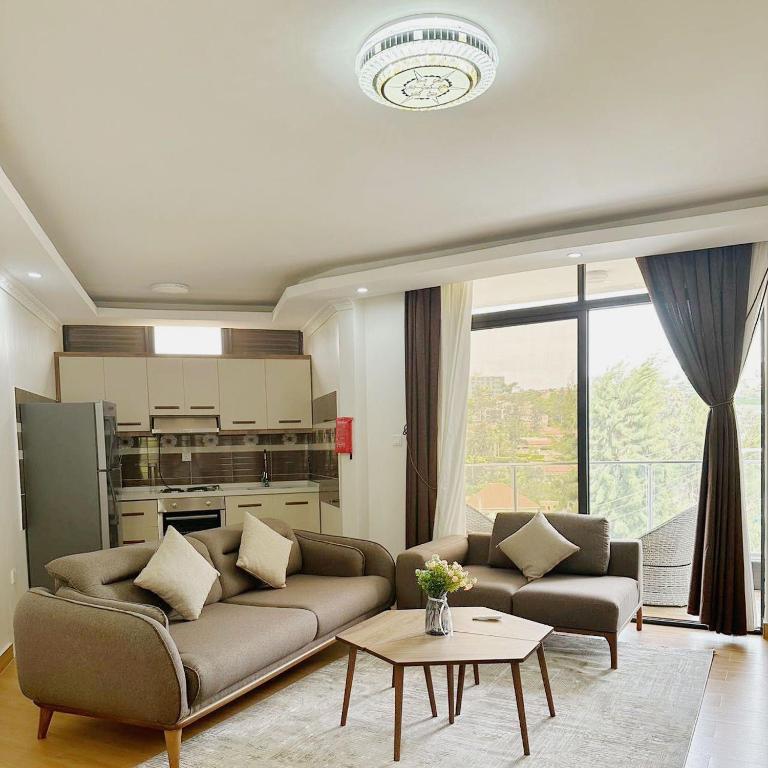 Kuchyň nebo kuchyňský kout v ubytování Cascadia Apartments Kigali