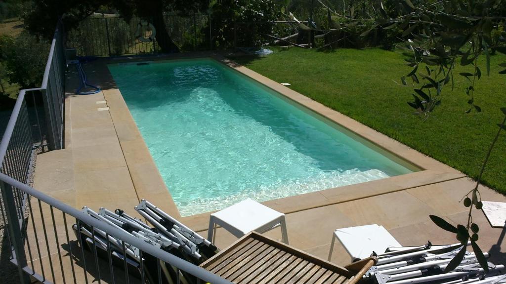 Piscina en o cerca de Podere San Quirico