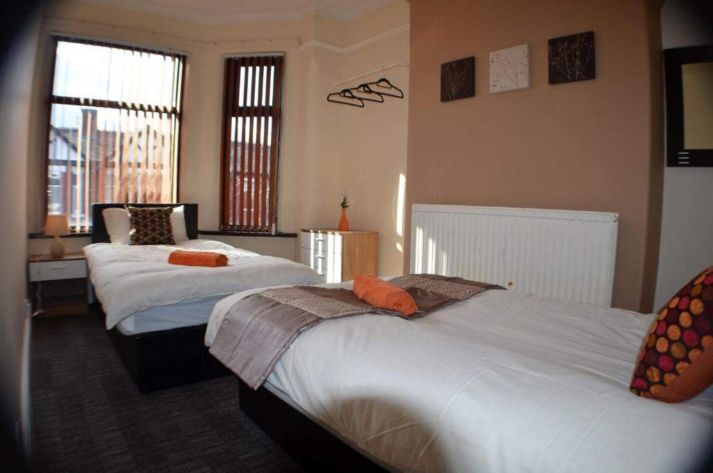 Postel nebo postele na pokoji v ubytování Birchfields Guest House
