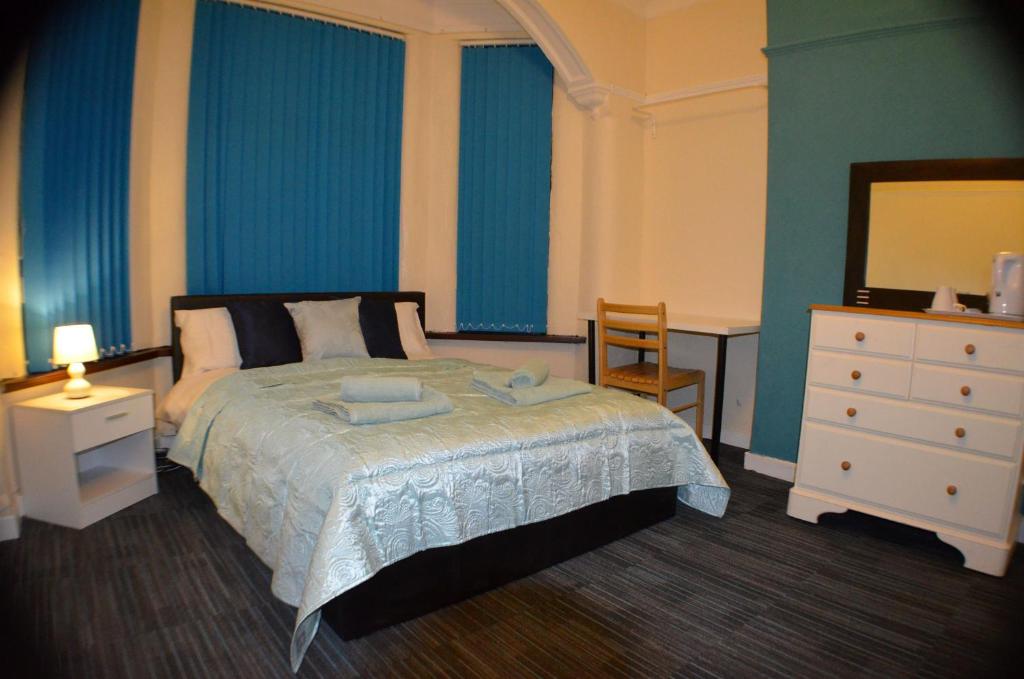 Postel nebo postele na pokoji v ubytování Birchfields Guest House