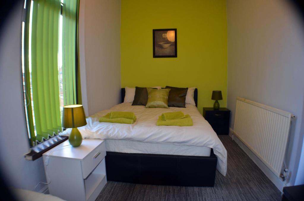 Postel nebo postele na pokoji v ubytování Birchfields Guest House