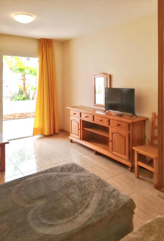 A television and/or entertainment centre at Charming Studio in Costa del Silencio, 45 m², Near Pool
