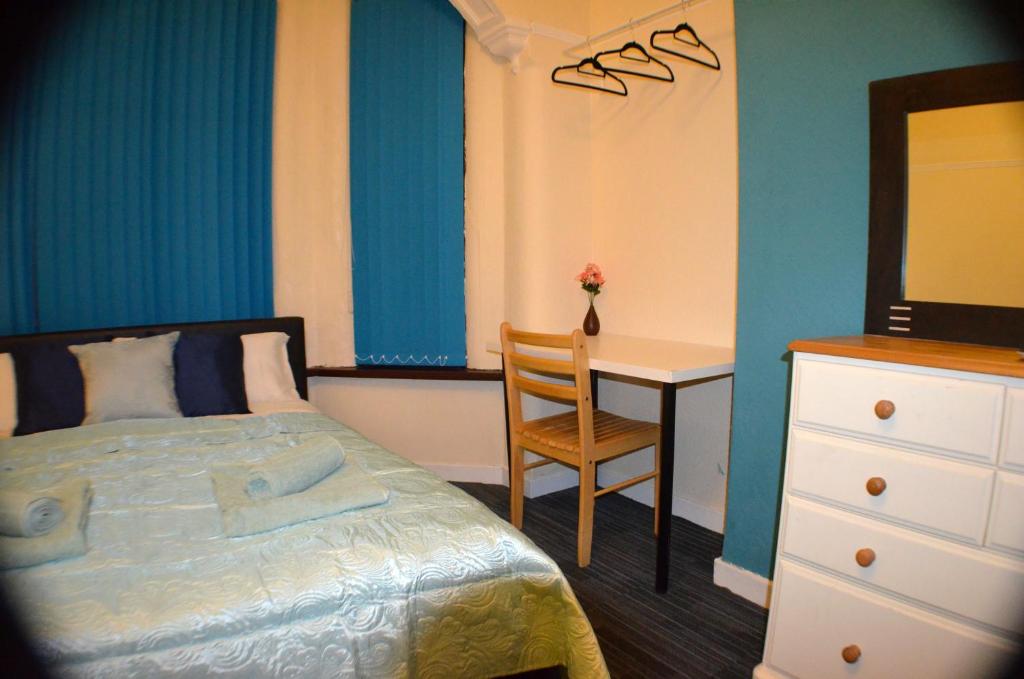 Postel nebo postele na pokoji v ubytování Birchfields Guest House