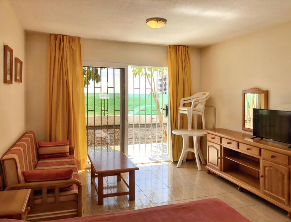 A television and/or entertainment centre at Charming Studio in Costa del Silencio, 45 m², Near Pool