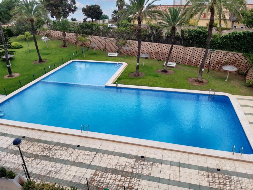 Bazén v ubytovaní Spacious apartment in Calpe of 100 m² with shared pool! alebo v jeho blízkosti