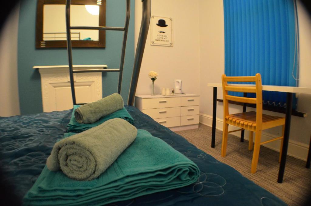 Postel nebo postele na pokoji v ubytování Birchfields Guest House