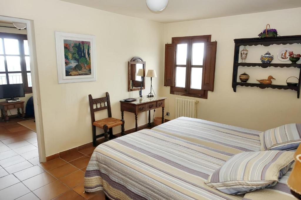 Postel nebo postele na pokoji v ubytování Spacious Apartment in San Pedro de Ribas with Shared Pool