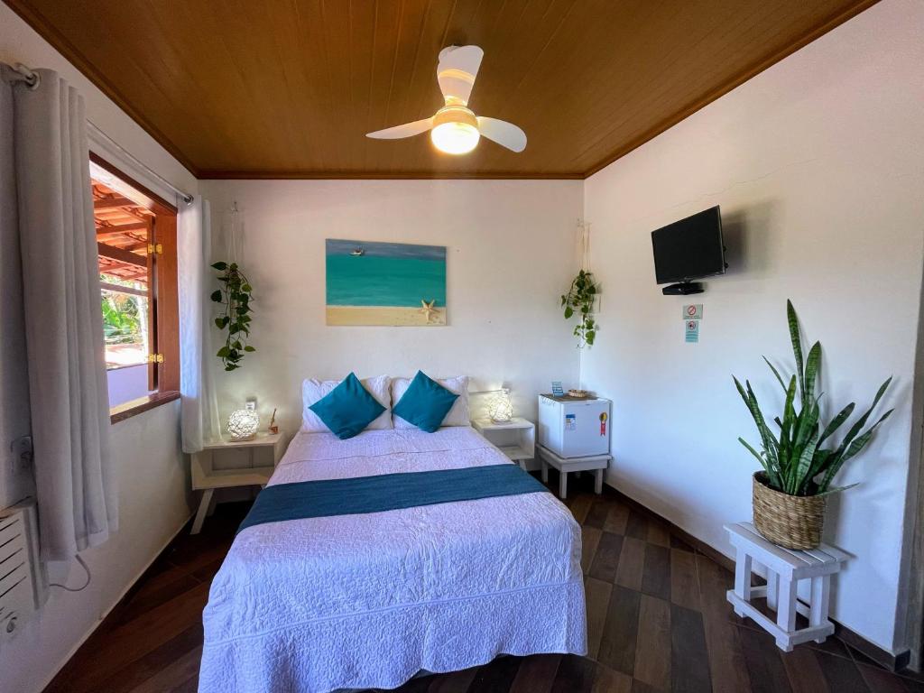 Postel nebo postele na pokoji v ubytování Suites Casa Azul-Vila do Abraão- conforto, limpeza, ótima localização