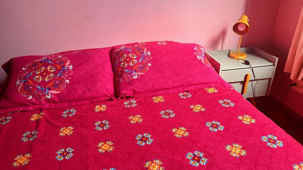 Cama ou camas em um quarto em Vila Santê