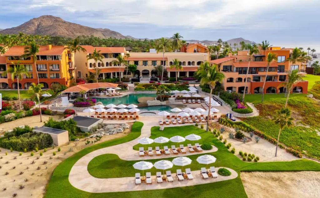 an aerial view of a resort with a swimming pool at 2BD Exclusive Cabo Corridor Beach Front Luxury in San José del Cabo