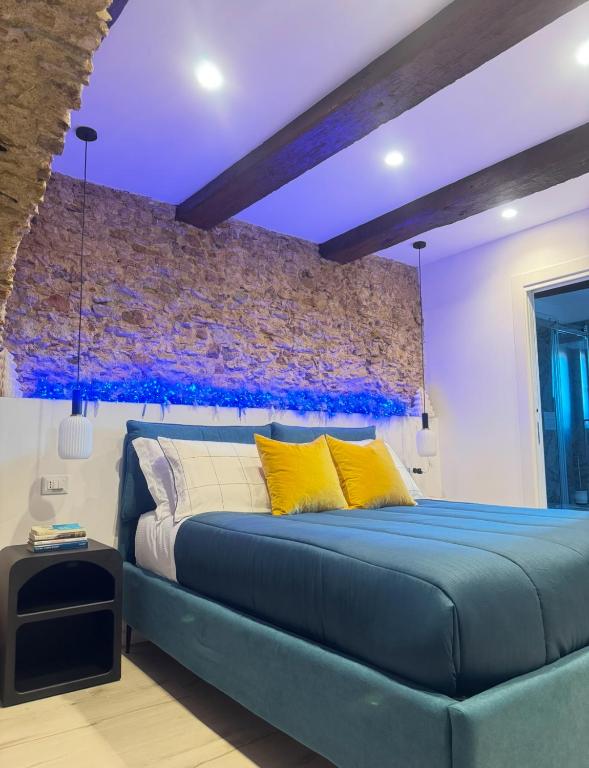 Postel nebo postele na pokoji v ubytování Arco di Pietra B&B