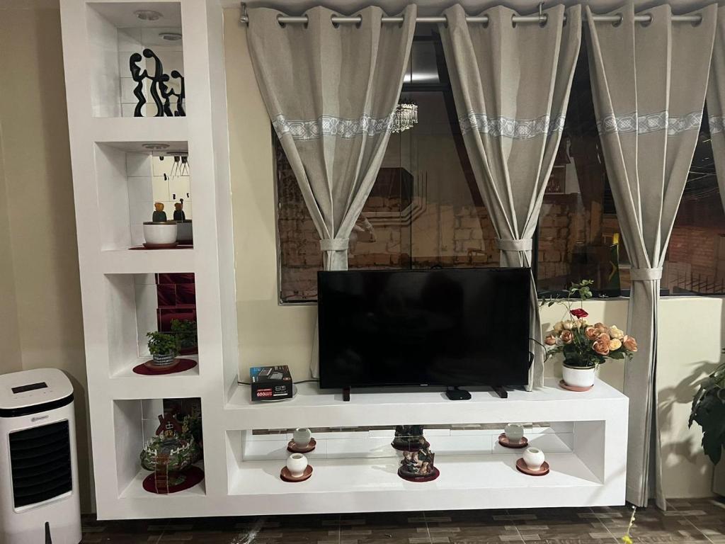 TV a/nebo společenská místnost v ubytování Hotel Spa Machupicchu