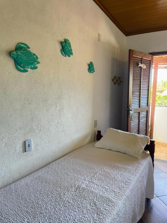 Postel nebo postele na pokoji v ubytování Suites Casa Azul-Vila do Abraão- conforto, limpeza, ótima localização