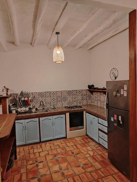 Kuchyň nebo kuchyňský kout v ubytování Casa VaraEchada en Barichara