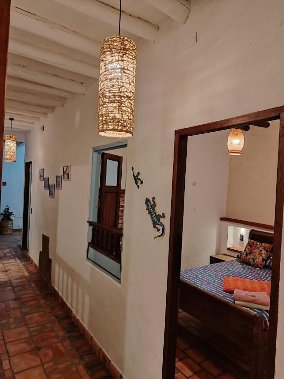 Postel nebo postele na pokoji v ubytování Casa VaraEchada en Barichara