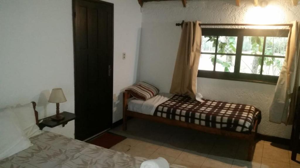 Postel nebo postele na pokoji v ubytování Refugio del Solís