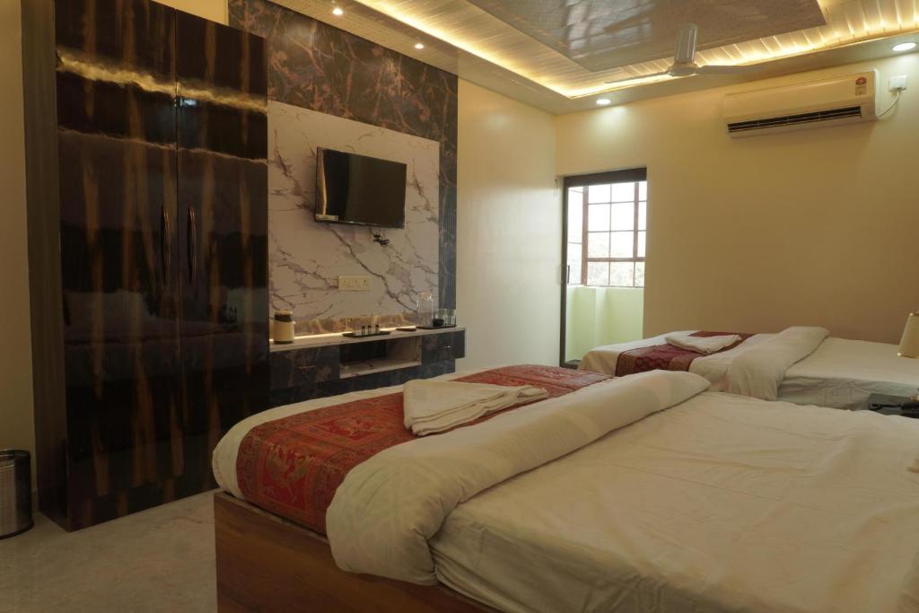 Postel nebo postele na pokoji v ubytování Classy5 Guest House