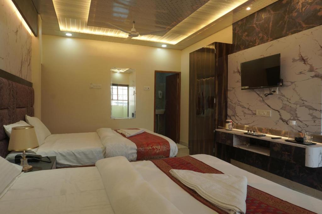 TV a/nebo společenská místnost v ubytování Classy5 Guest House