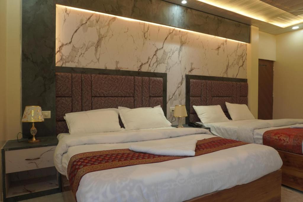 Postel nebo postele na pokoji v ubytování Classy5 Guest House