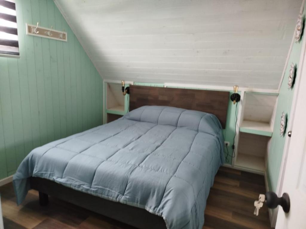 Postel nebo postele na pokoji v ubytování Hostal Angy