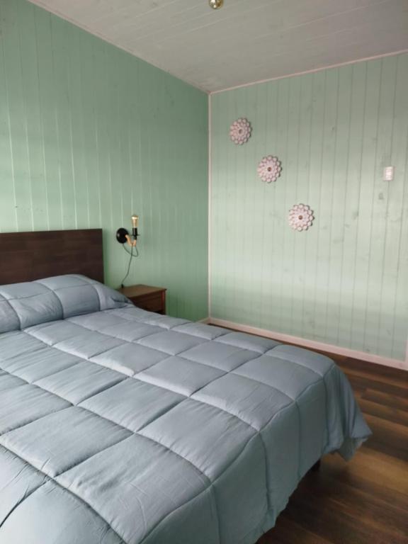 Postel nebo postele na pokoji v ubytování Hostal Angy