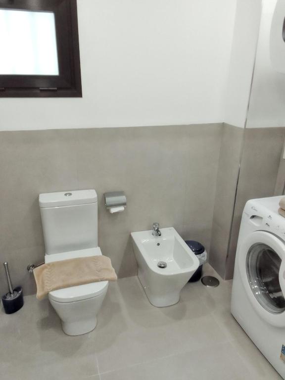Koupelna v ubytování Comfortable Apartment in Arona, 50 m², Shared Pool