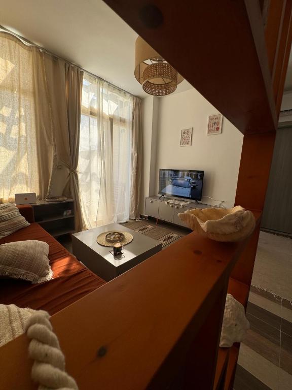 TV a/nebo společenská místnost v ubytování Ola Red Sea