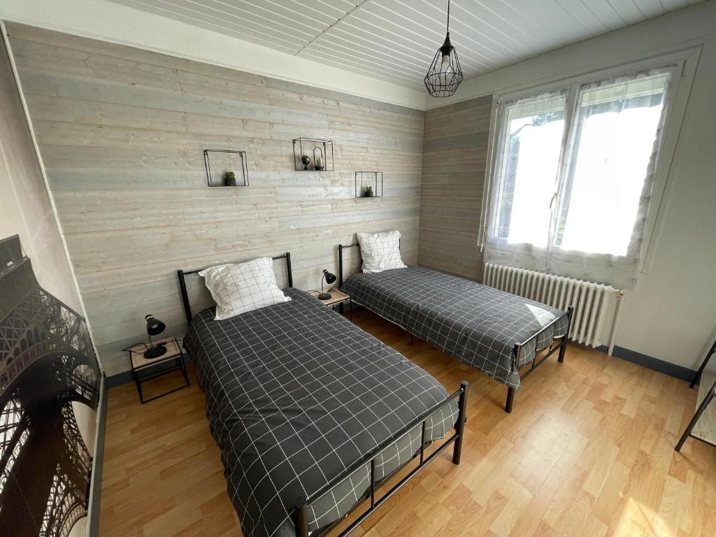 Posteľ alebo postele v izbe v ubytovaní La Maison Portaise