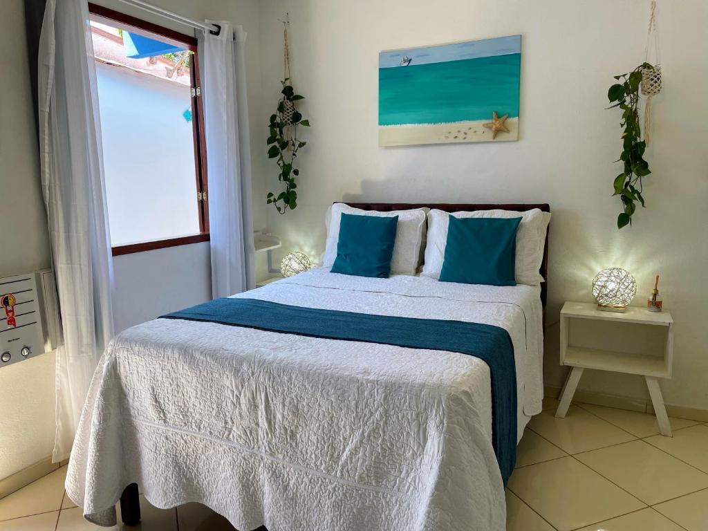 Postel nebo postele na pokoji v ubytování Suites Casa Azul-Vila do Abraão- conforto, limpeza, ótima localização