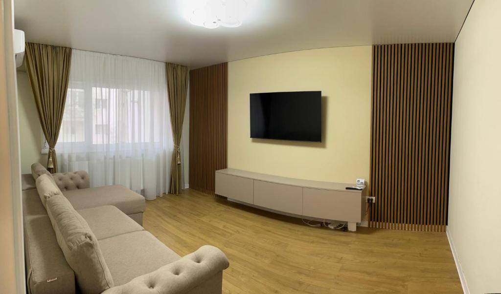 TV/trung tâm giải trí tại Lina&Adi