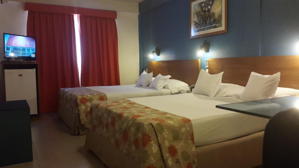 Krevet ili kreveti u jedinici u okviru objekta Hotel Amalfi