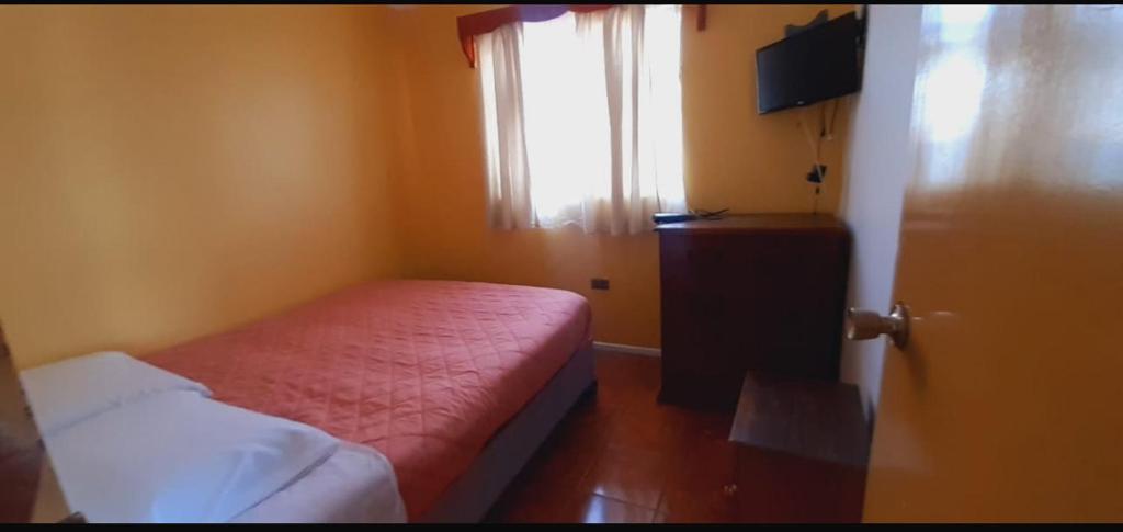 Voodi või voodid majutusasutuse Hostal El Descanso toas