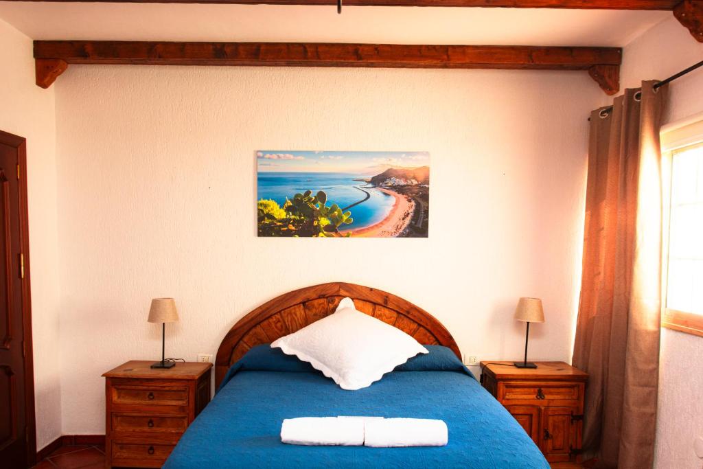 Posteľ alebo postele v izbe v ubytovaní Hotel Las Cañadas