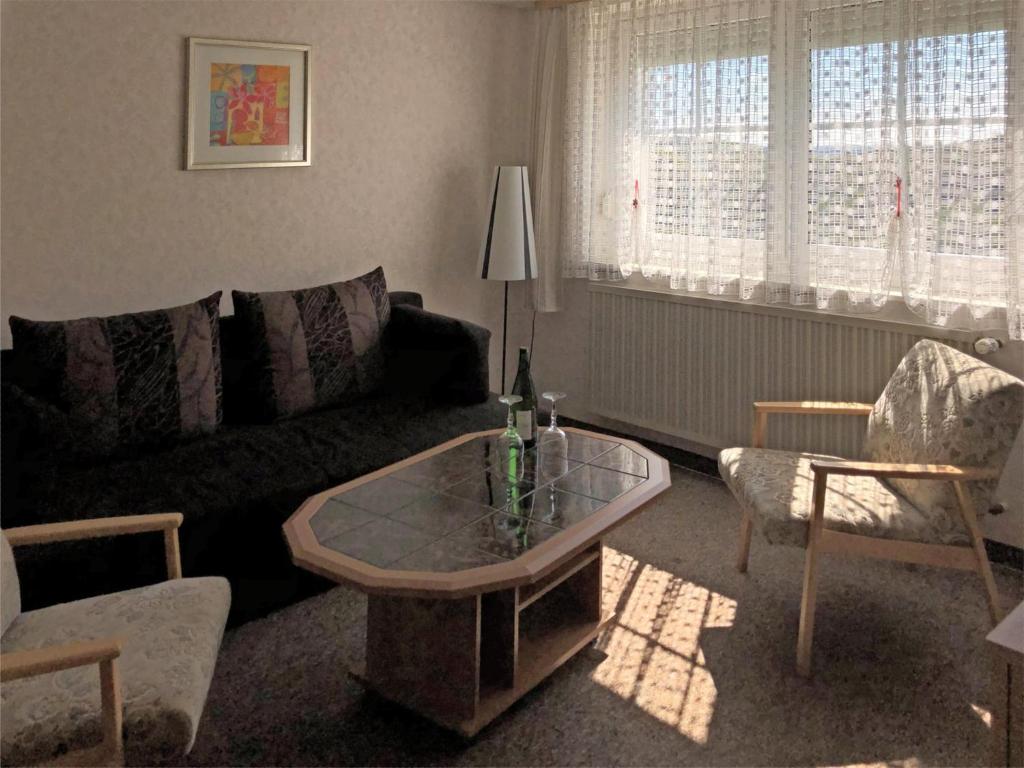 Posezení v ubytování Apartment in Wichsenstein near Gößweinstein Castle