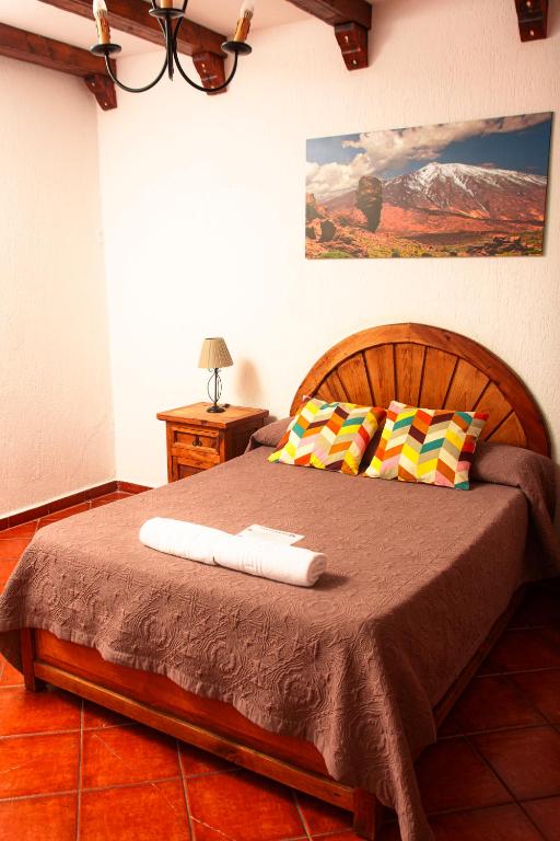 Posteľ alebo postele v izbe v ubytovaní Hotel Las Cañadas