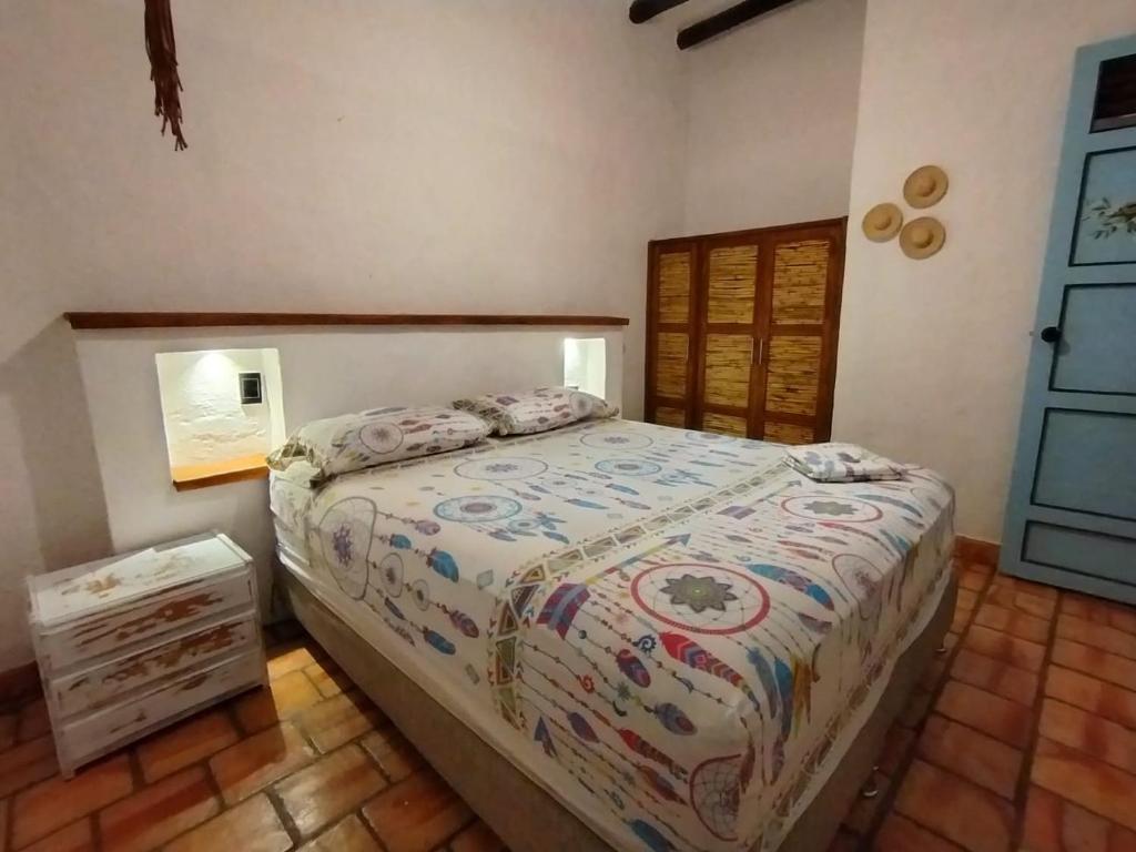 Postel nebo postele na pokoji v ubytování Casa VaraEchada en Barichara
