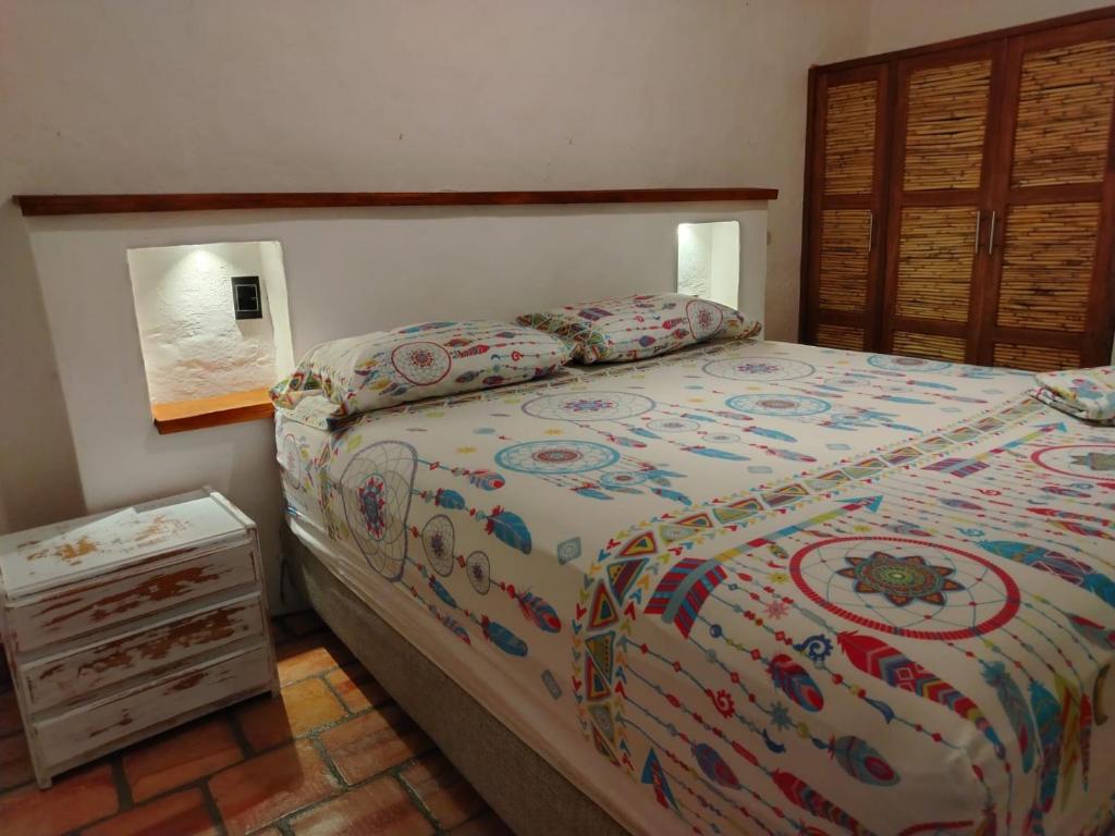 Postel nebo postele na pokoji v ubytování Casa VaraEchada en Barichara