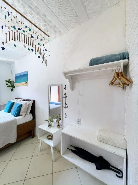 Postel nebo postele na pokoji v ubytování Suites Casa Azul-Vila do Abraão- conforto, limpeza, ótima localização
