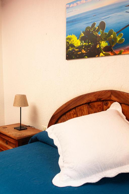 Posteľ alebo postele v izbe v ubytovaní Hotel Las Cañadas