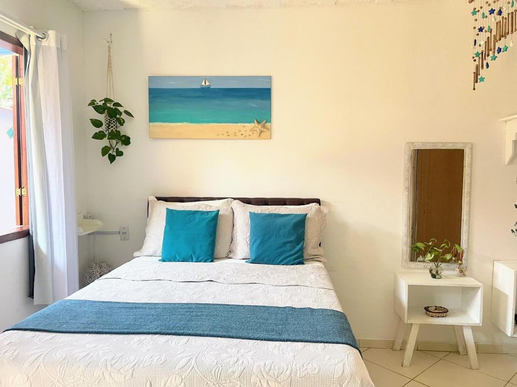 Postel nebo postele na pokoji v ubytování Suites Casa Azul-Vila do Abraão- conforto, limpeza, ótima localização
