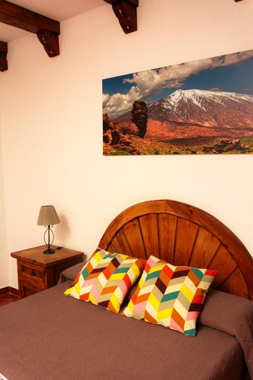 Posteľ alebo postele v izbe v ubytovaní Hotel Las Cañadas