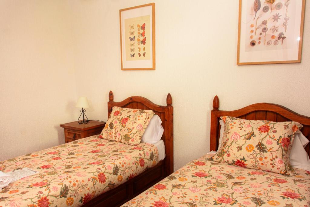 Posteľ alebo postele v izbe v ubytovaní Hotel Las Cañadas