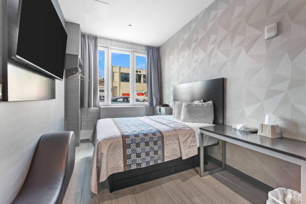 Postel nebo postele na pokoji v ubytování Hotel 365 Bronx - Yankee Stadium
