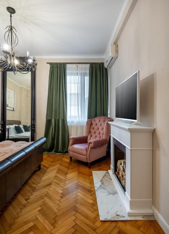TV a/nebo společenská místnost v ubytování Casa Lu