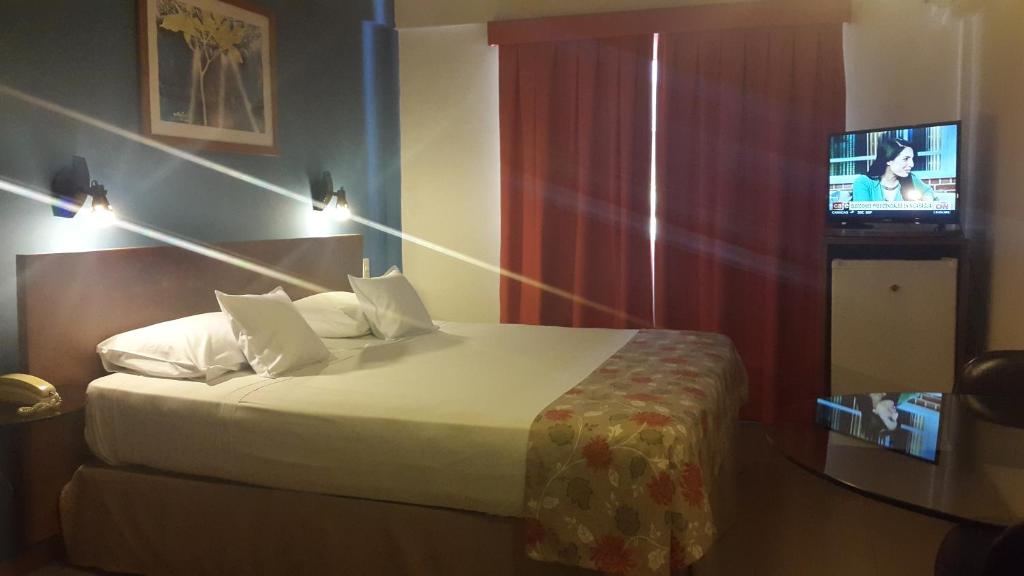 Krevet ili kreveti u jedinici u okviru objekta Hotel Amalfi
