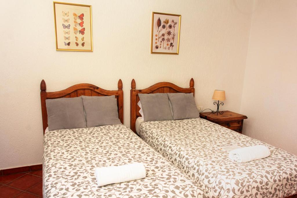 Posteľ alebo postele v izbe v ubytovaní Hotel Las Cañadas