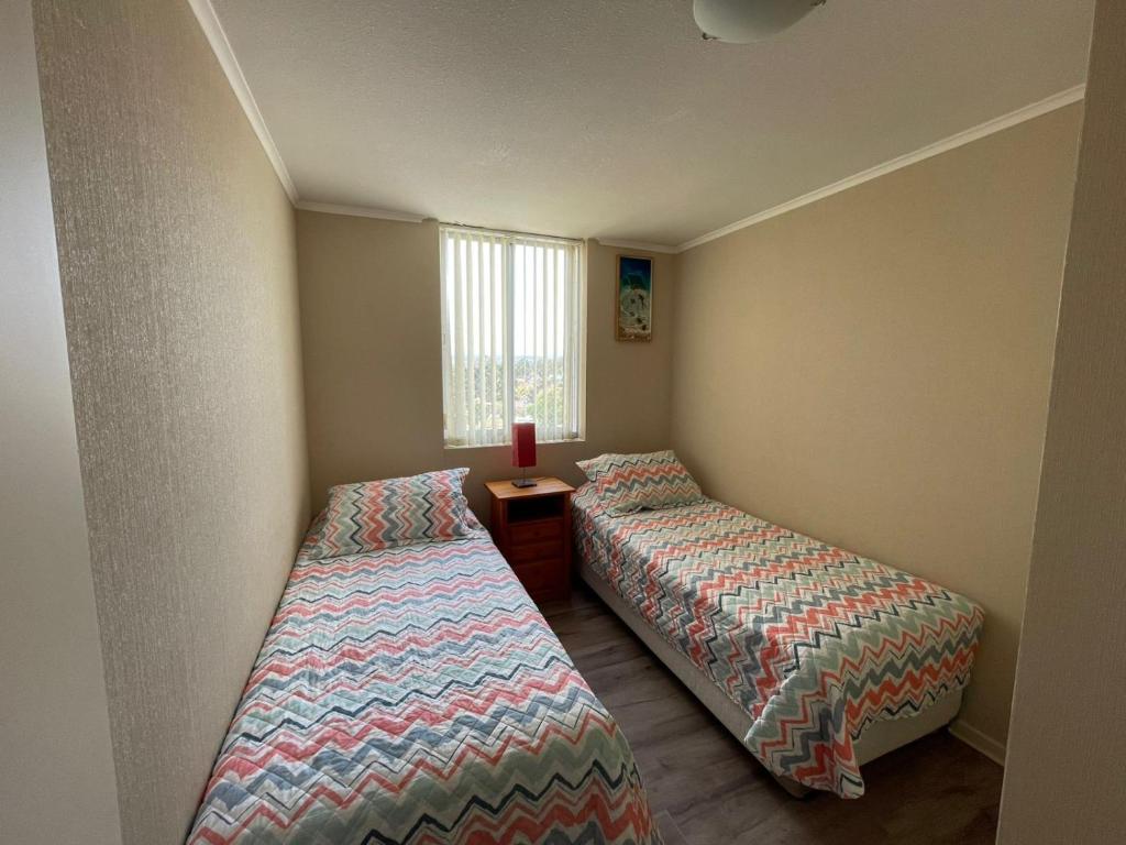 Postel nebo postele na pokoji v ubytování Departamento Laguna Vista